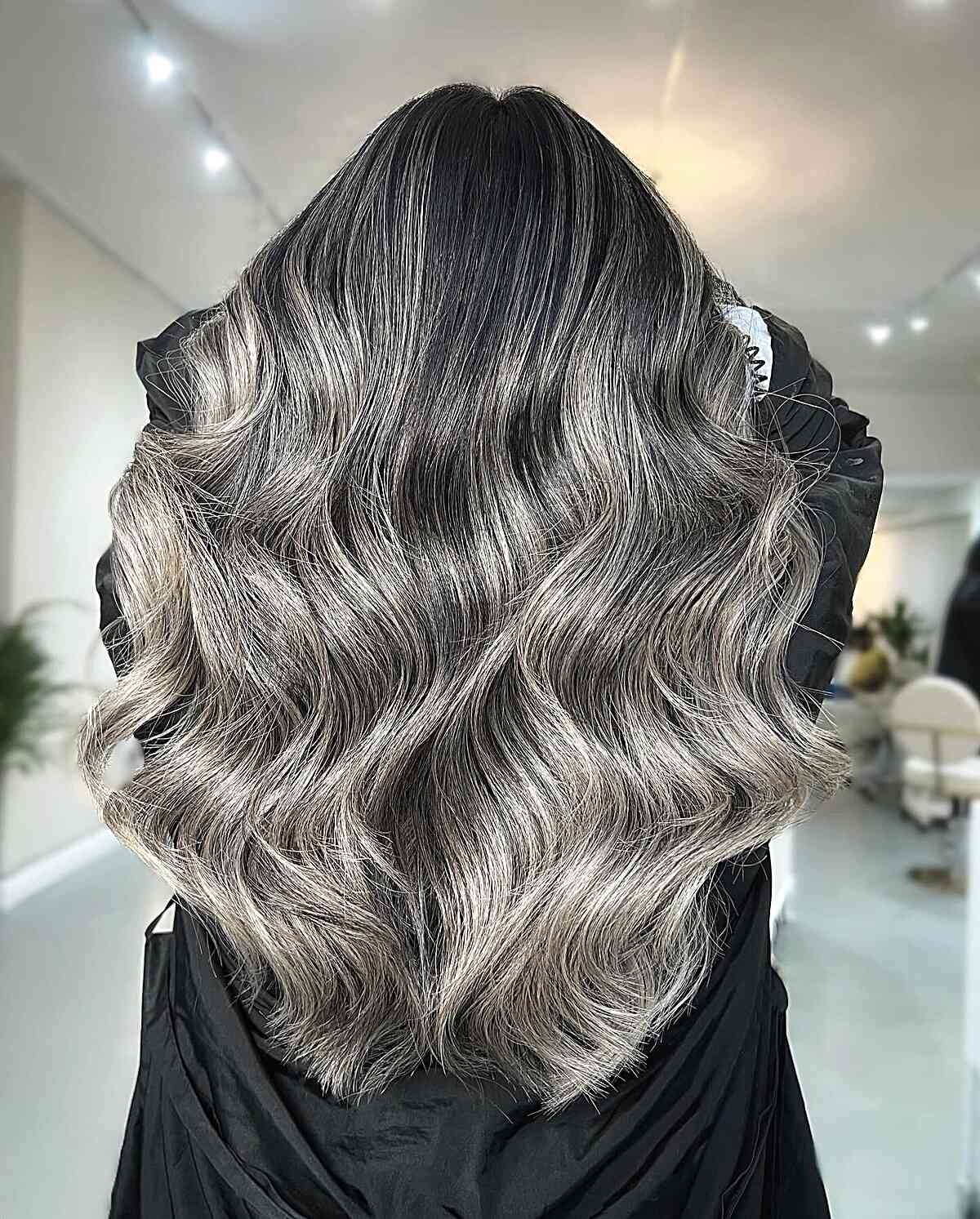 Ashy Platinum Hair Highlights with Long Silver Balayage Waves