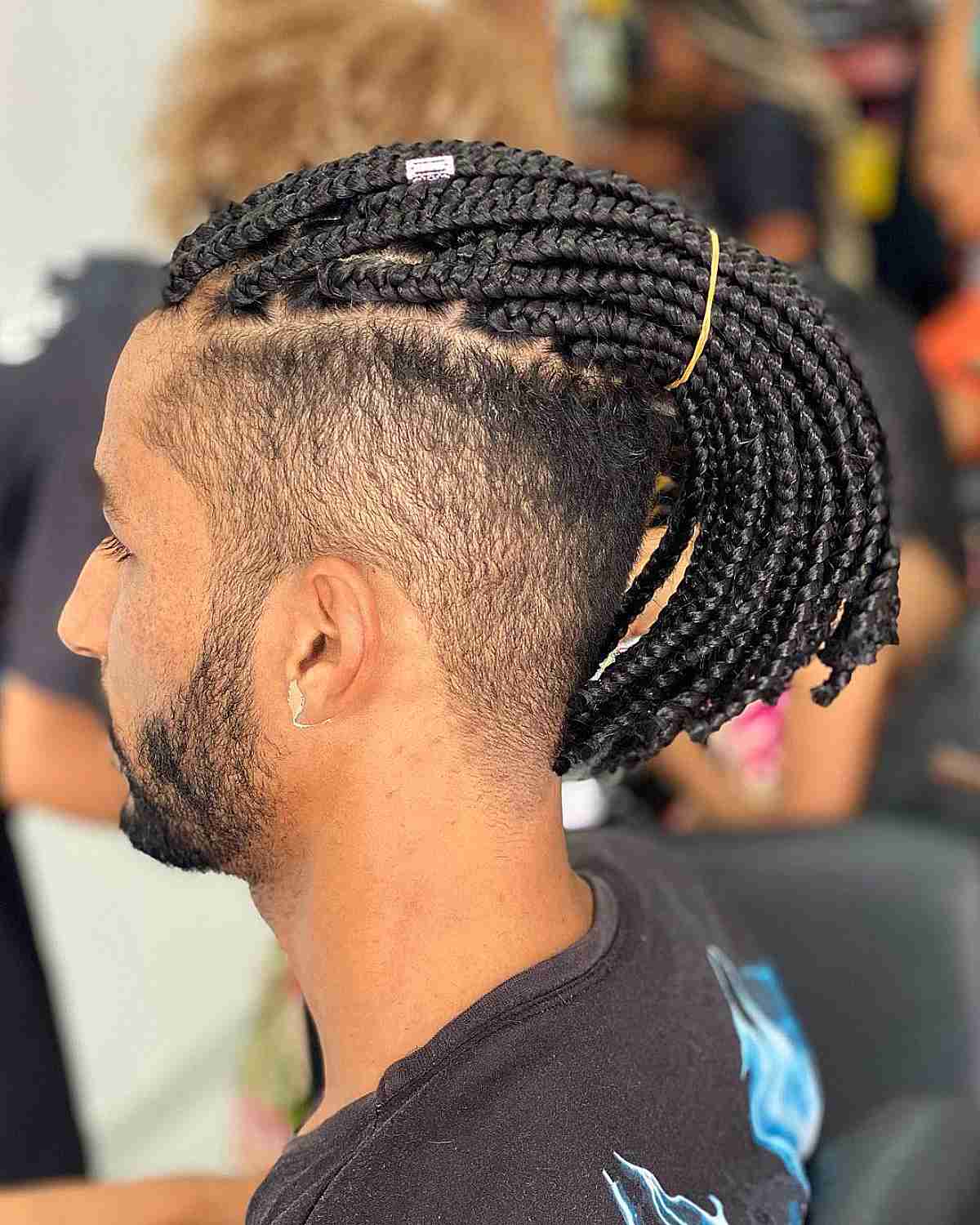 Braided Ponytail with a High Fade for Men