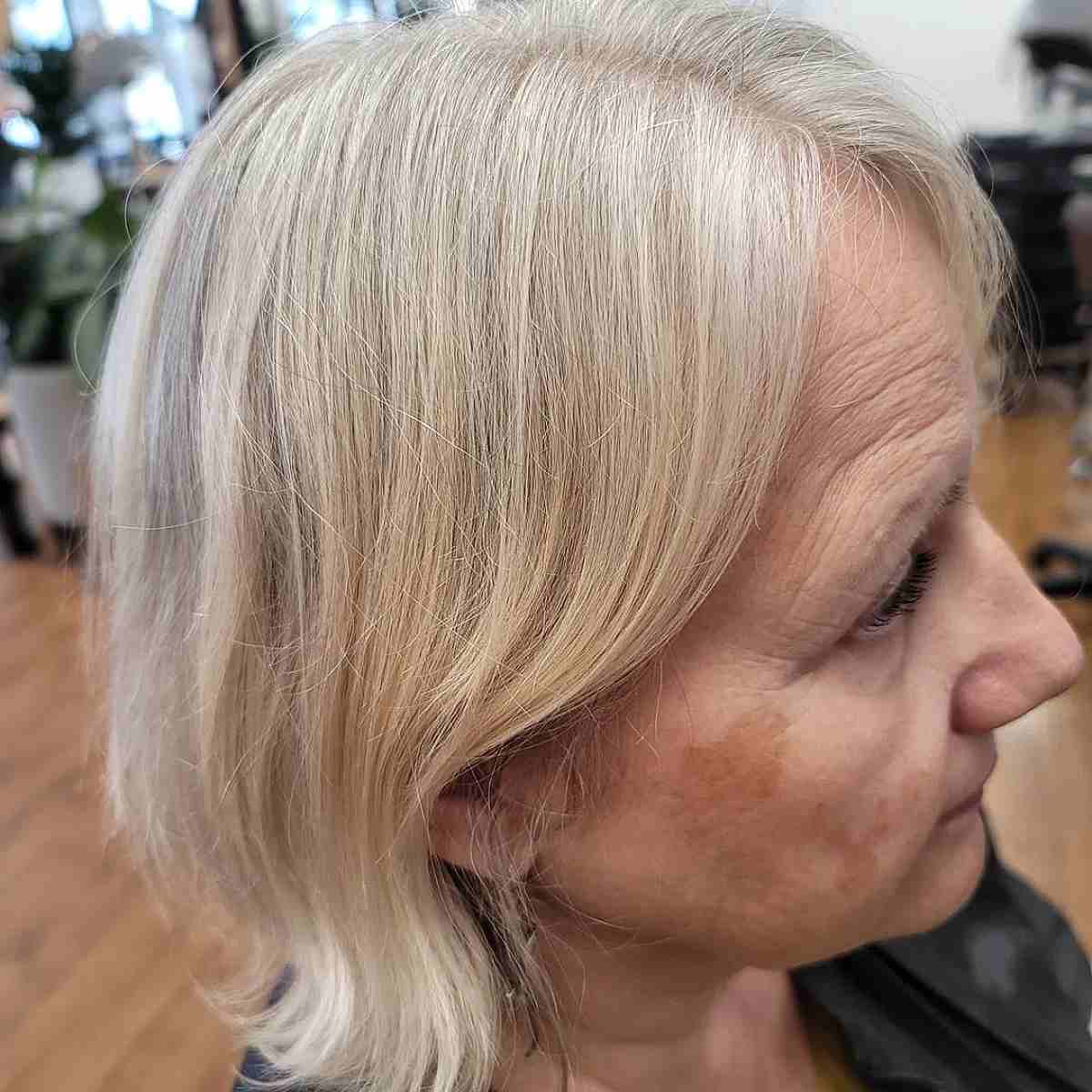 Gorgeous Gray Bob with Long Side Swept Bangs for Ladies Over Sixty