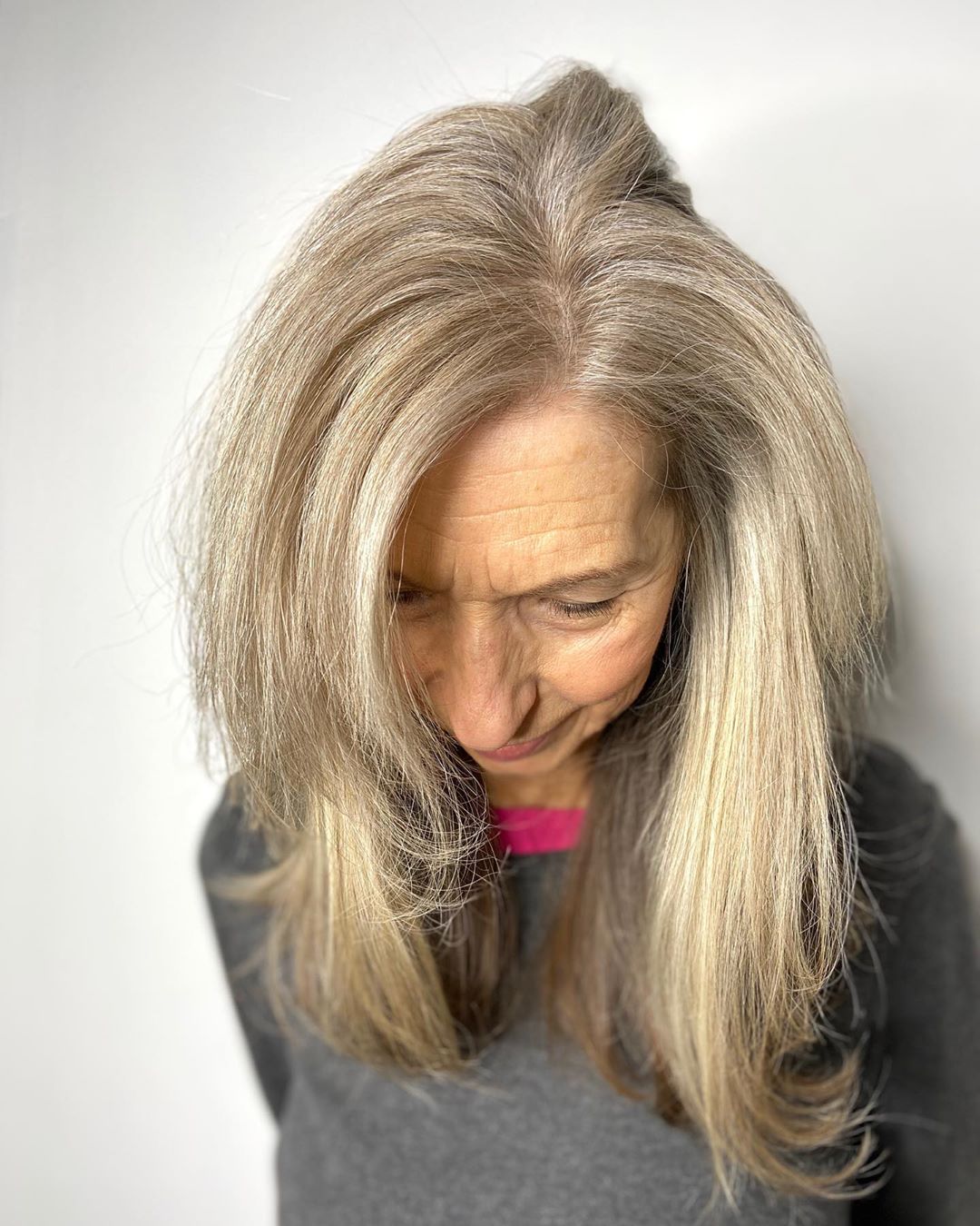 long straight haircut for a woman in her 70s