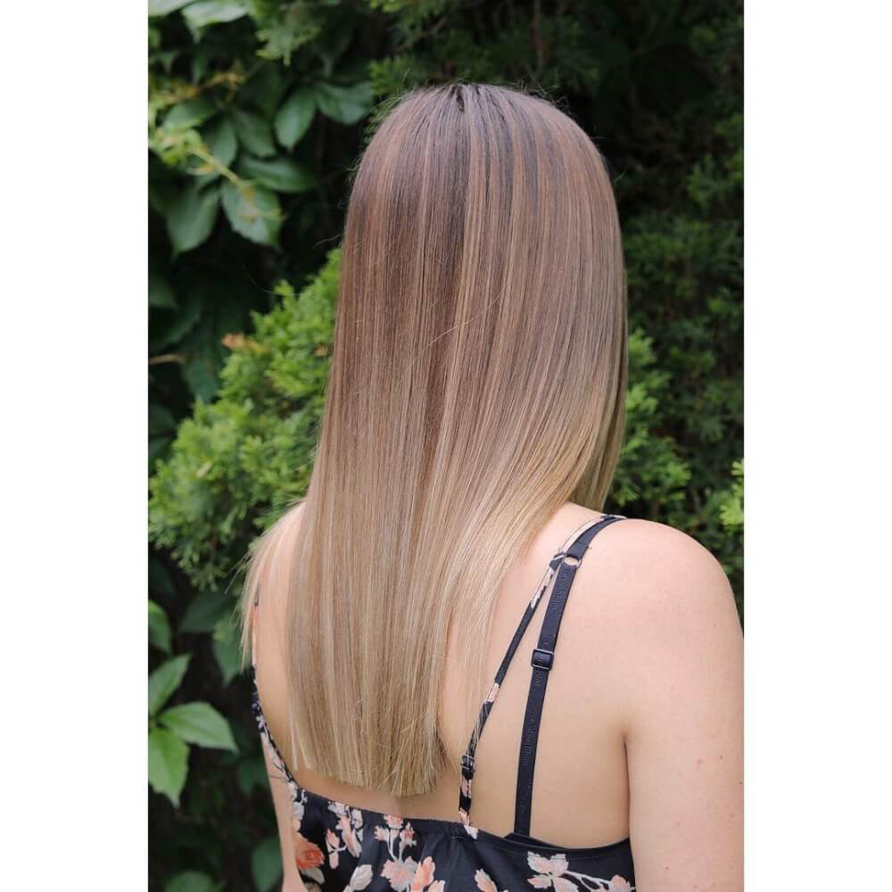 A stand-out blunt cut for thin long hair with balayage color