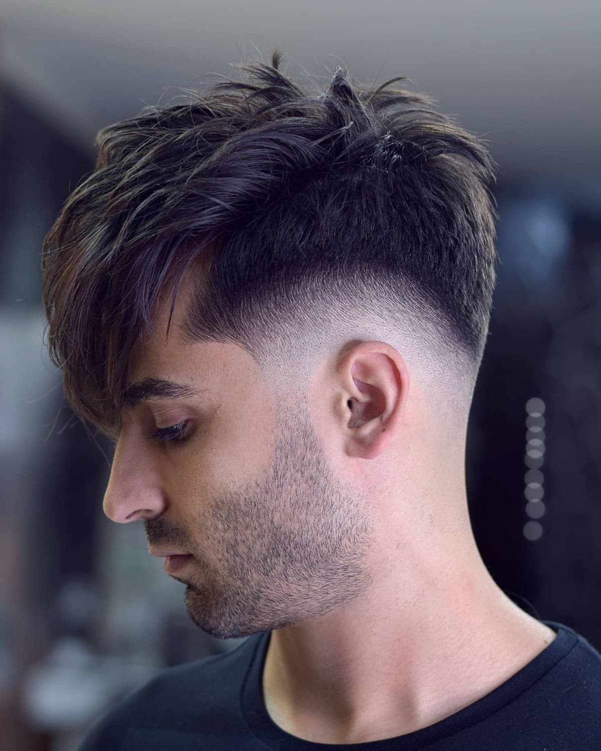 Men's short haircut with long bangs