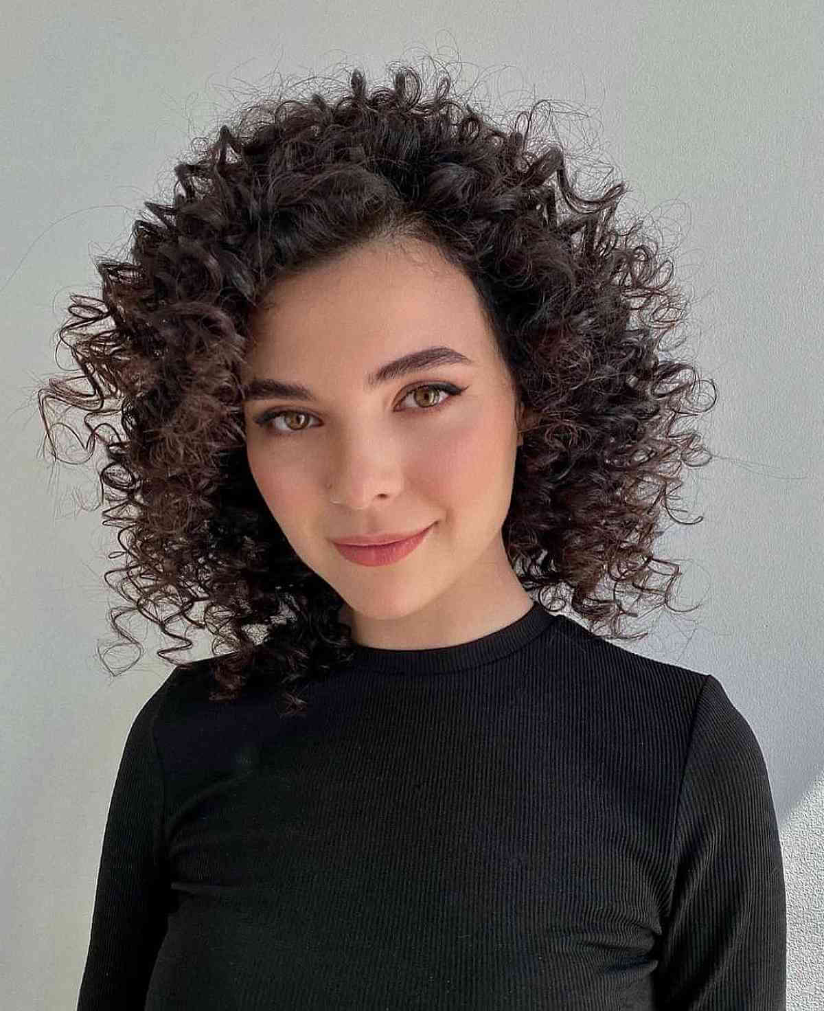 Remarkable Frizzy Curls on a Bob Cut