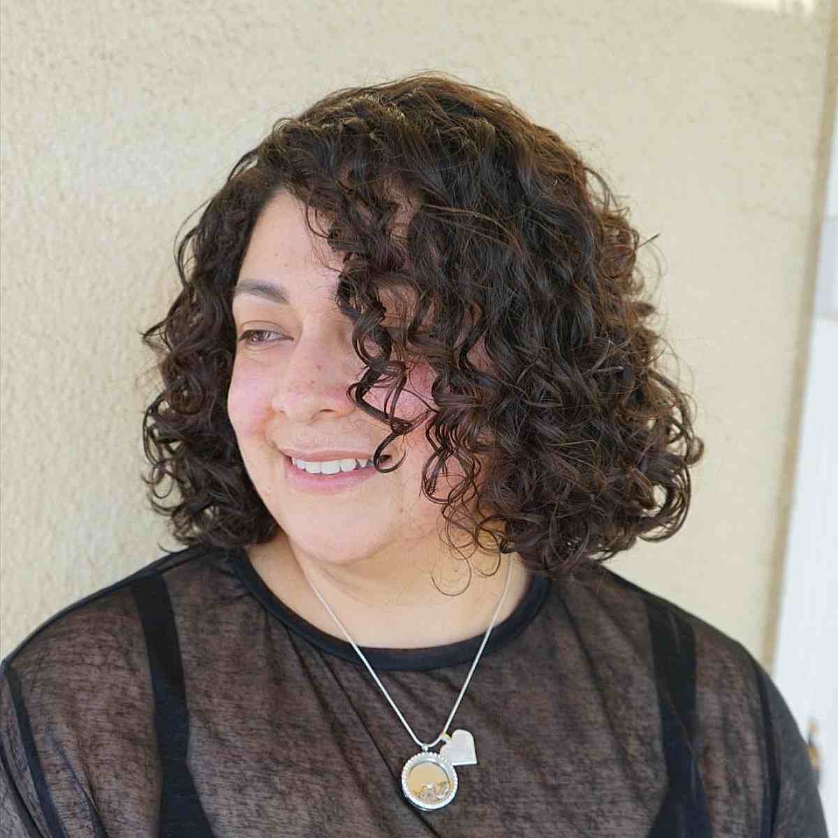 Sassy Side-Parted Textured Curly Bob for Round Faces