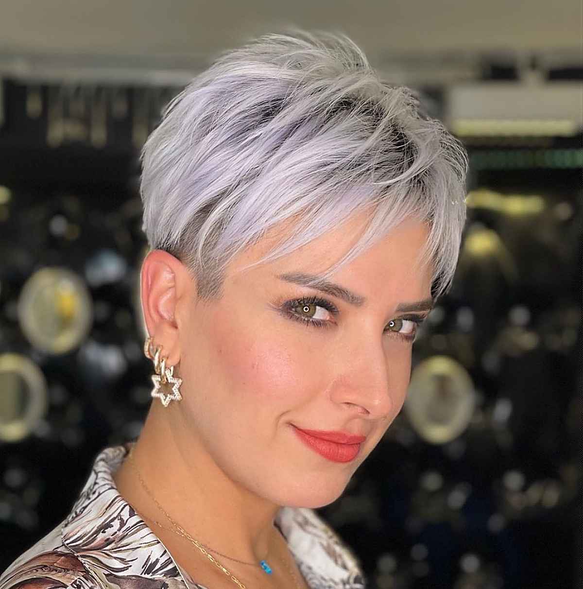 Cute silver pixie with an undercut and bangs