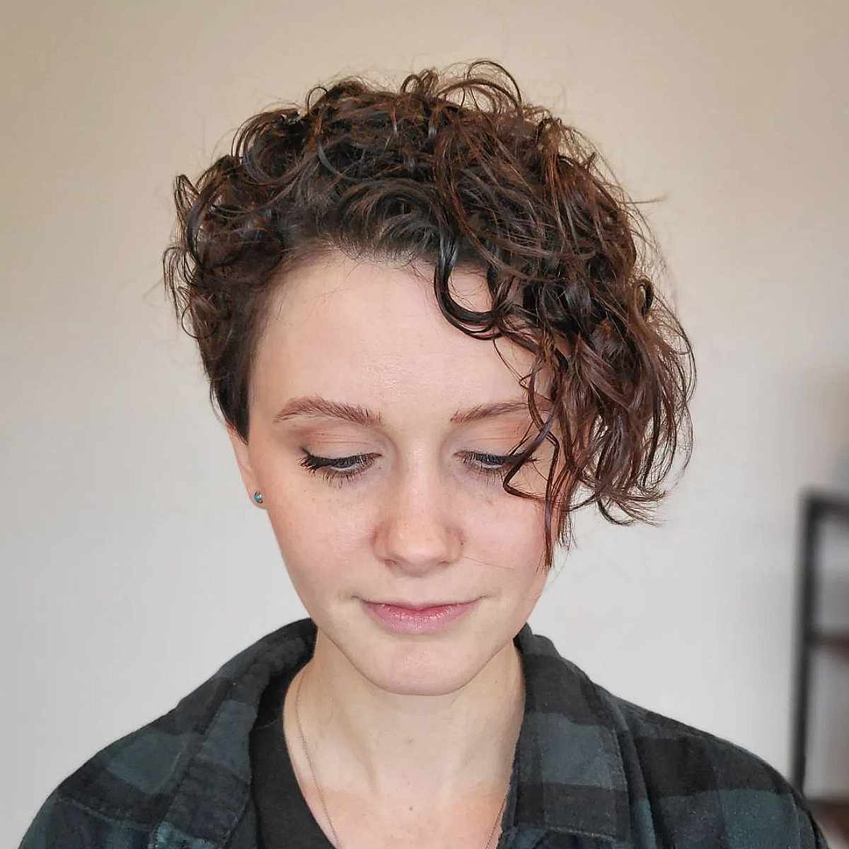 Trending Asymmetrical Haircut for Short Curly Hair